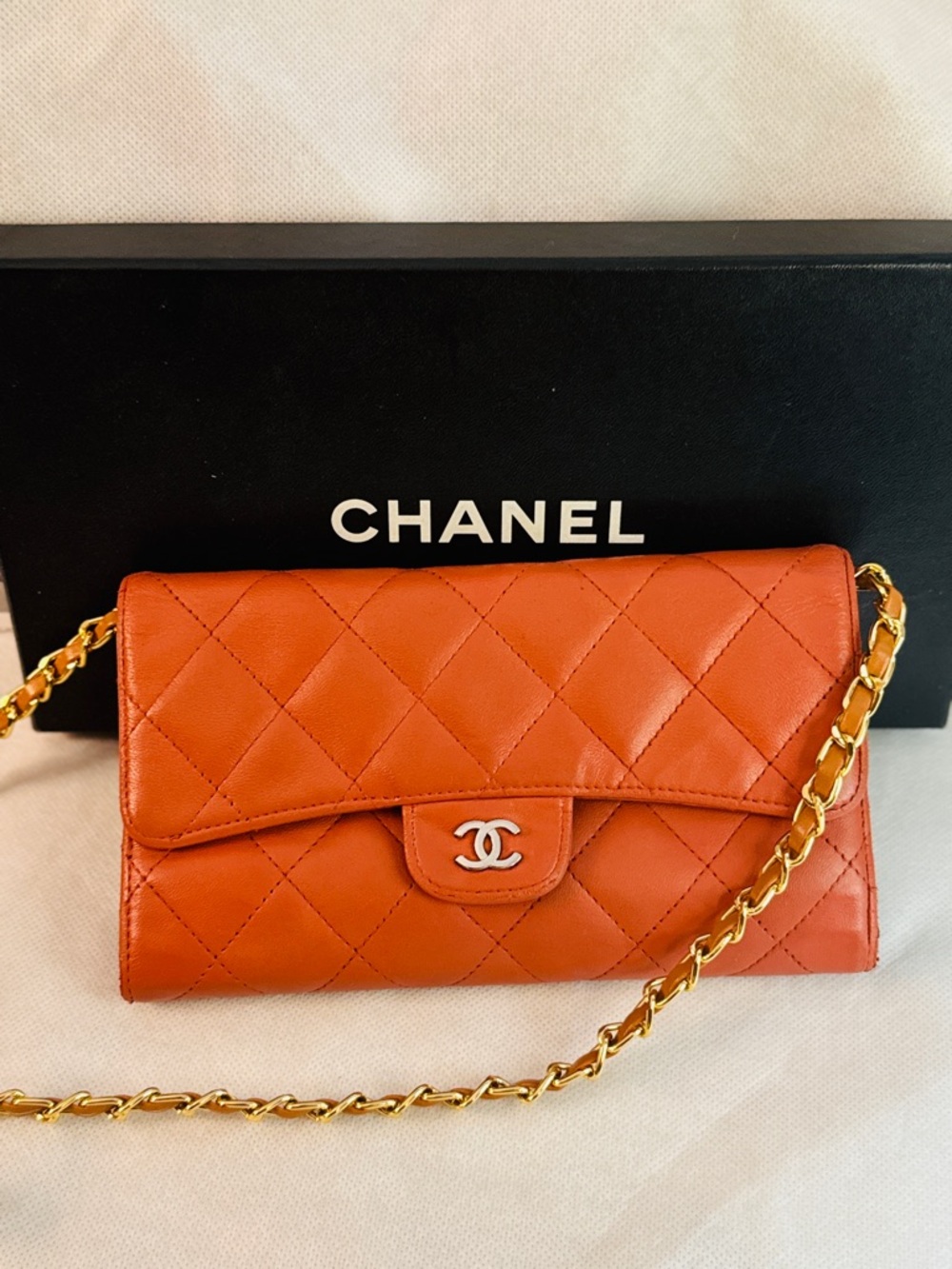 CHANEL Orange Quilted Lambskin Chain Crossbody